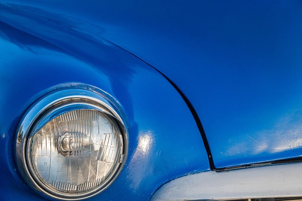Detail of front end headlight on a classic blue American car in Vieja-old Habana-Havana-Cuba art print by Janis Miglavs for $57.95 CAD